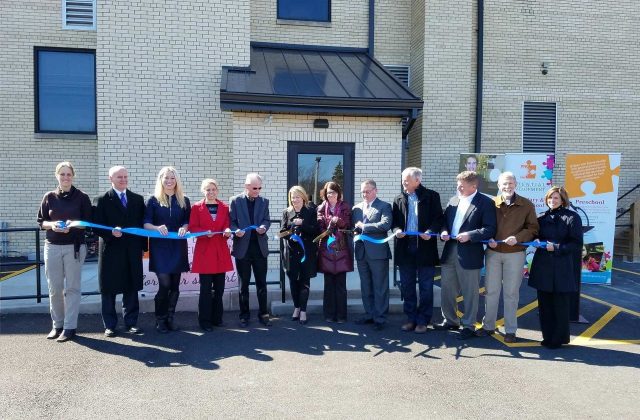 Elevator ribbon cutting at Potential Development in Youngstown